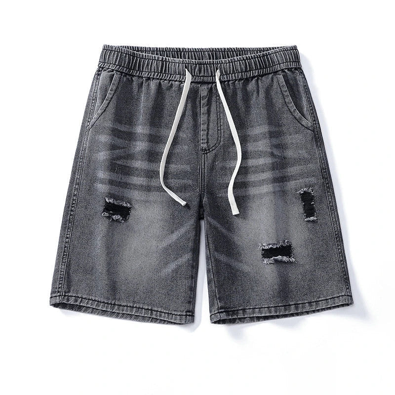Premium British-crafted vintage-inspired ripped denim shorts for men with a straight-leg silhouette and authentic distressed details
