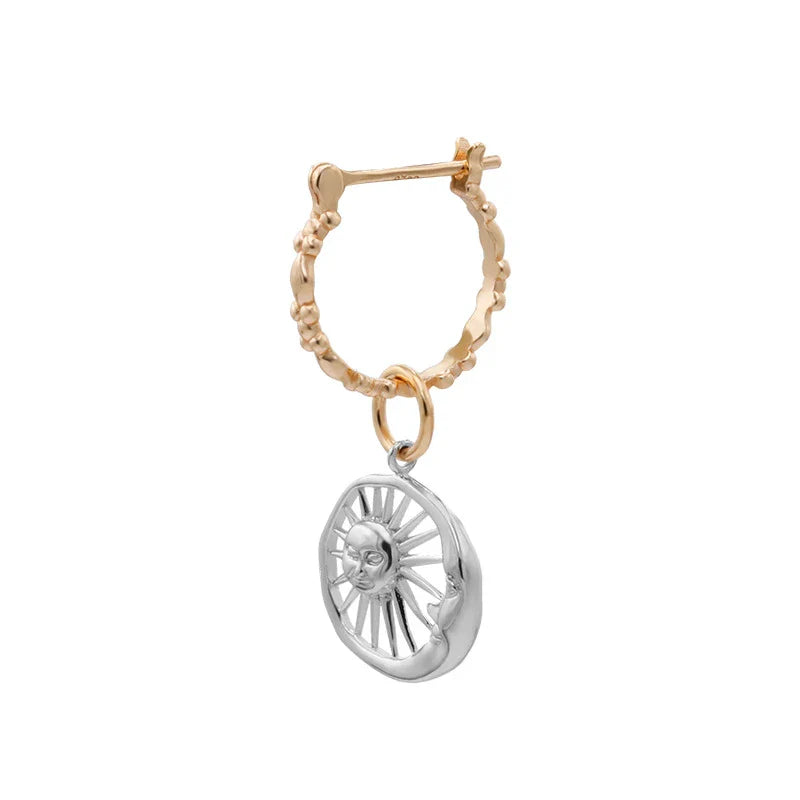 Elegant sterling silver sun and moon earrings with a refined geometric design