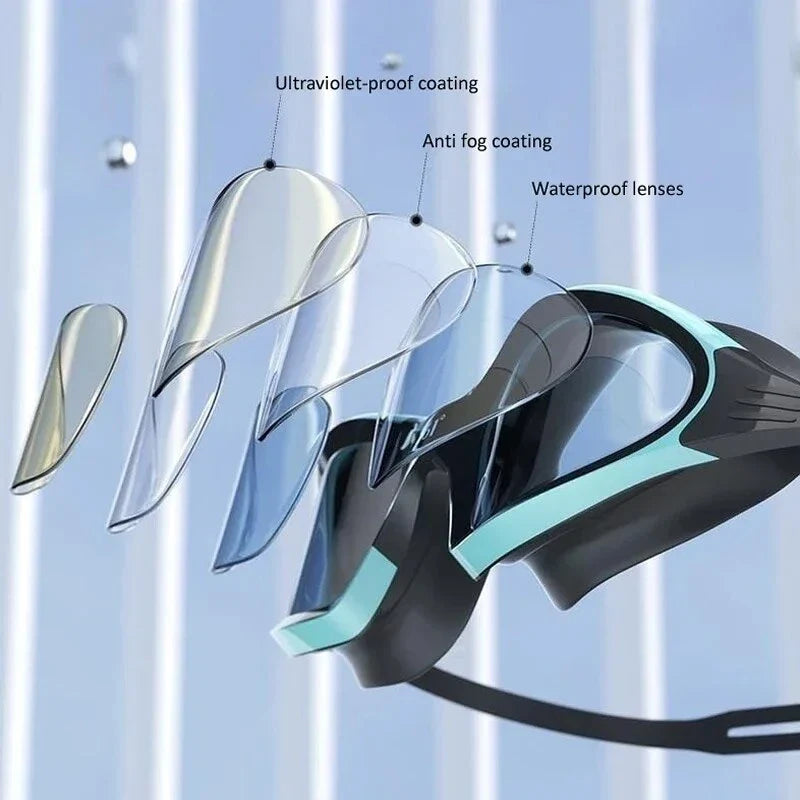 A pair of high-performance anti-fog, waterproof swimming goggles with polycarbonate lenses and a flexible silicone frame, designed for optimal clarity and comfort during swimming activities.