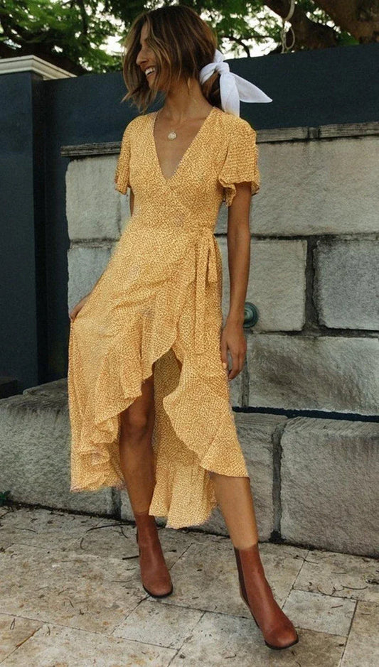 Elegant V-neck short-sleeved lace dress in a flattering silhouette, featuring delicate lace details and a blend of European and British fashion influences.