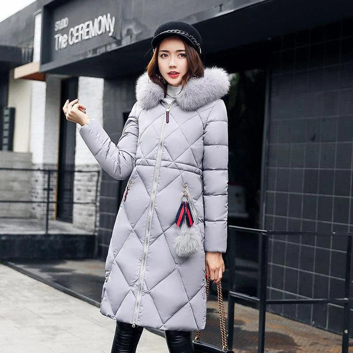 A premium padded down coat for women with a detachable hood, designed to provide warmth and style during the winter.
