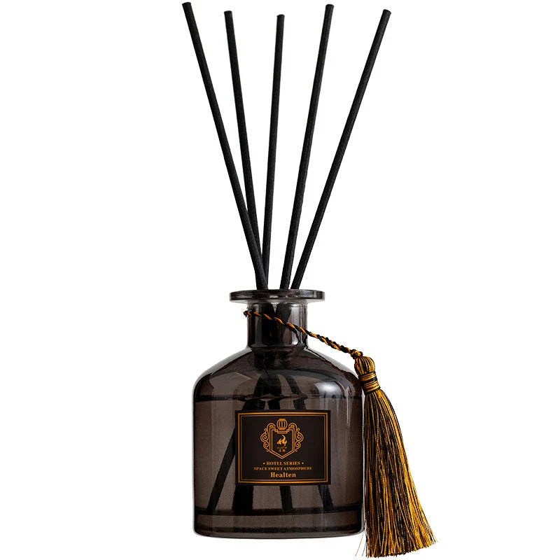 Elegant rattan aromatherapy diffuser with essential oils and fragrance, creating a calming and inviting atmosphere in a living space