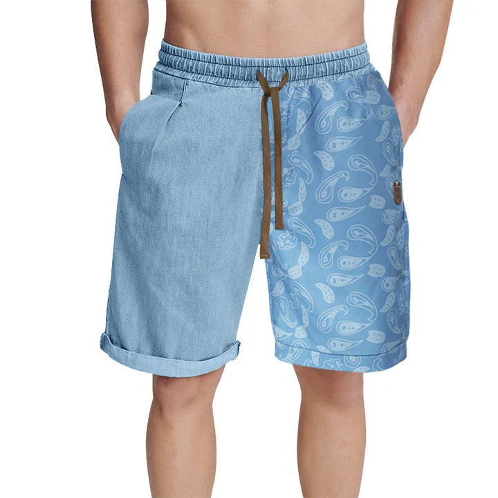 Relaxed-fit sports shorts in light blue and denim blue mosaic patterns, designed for casual everyday wear