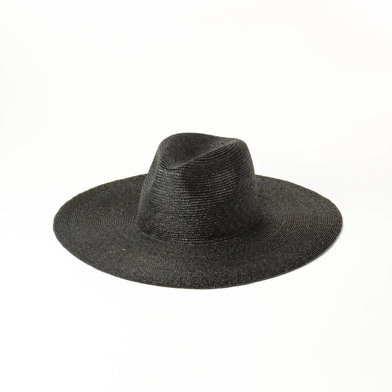 Premium outdoor sun protection straw hat in black, brown, and pinkish colours with a large brim and tie-dye pattern