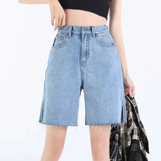 Premium high-rise wide-leg denim shorts in a classic blue colour, featuring a flattering silhouette and practical pockets