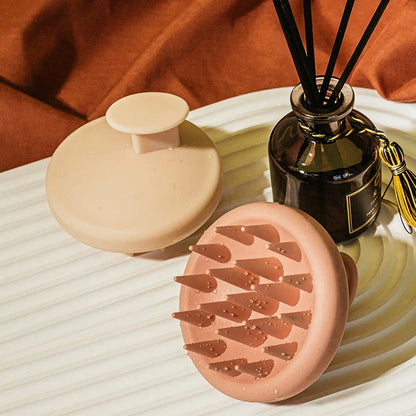 A green silicone scalp massager with soft bristles, designed to provide a soothing hair washing experience and promote healthy hair growth.