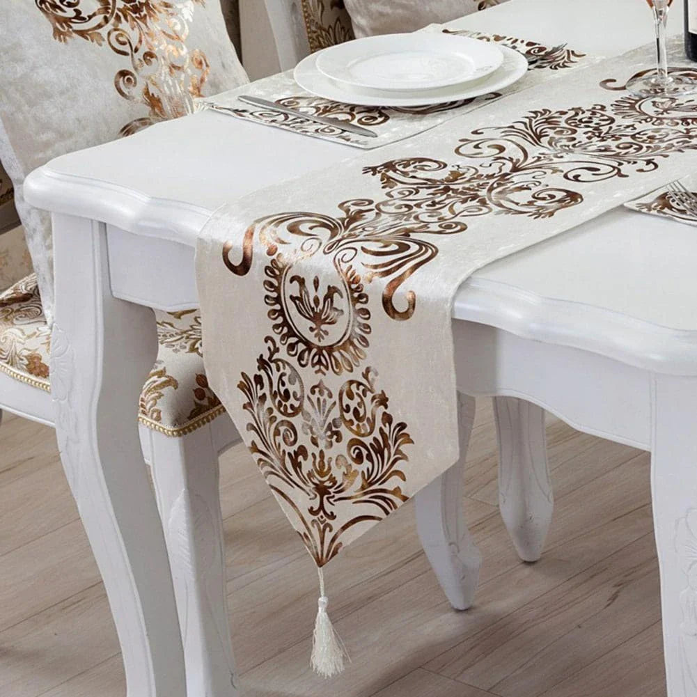 Elegant golden ornament table runner with intricate embroidery, adding a touch of regal charm to any dining setting.