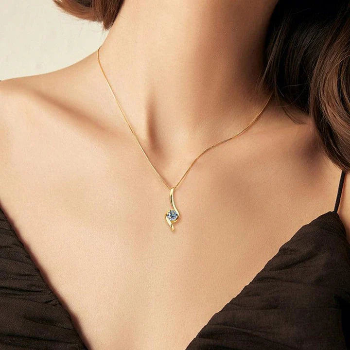 Elegant sterling silver diamond-inspired necklace with a sleek, geometric design