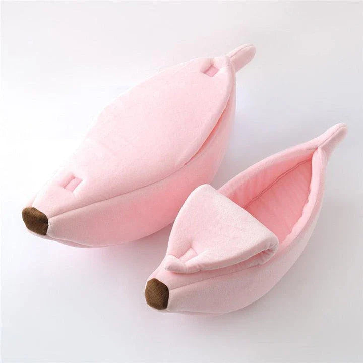 Cosy, plush banana-shaped cat bed in a variety of sizes, providing a comfortable retreat for feline friends