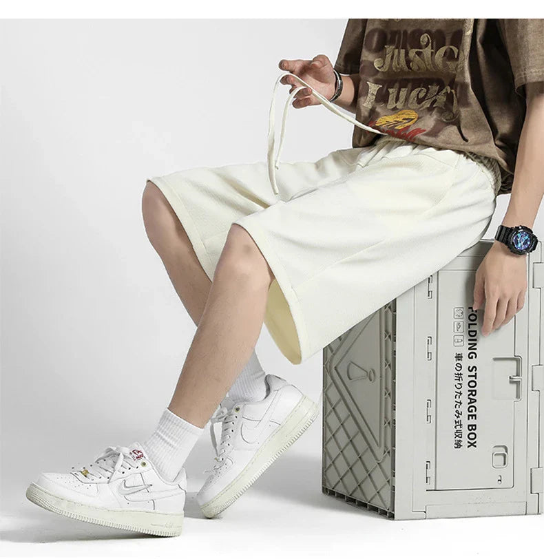 Premium straight-fit drawstring trousers in white, khaki, and black colours for stylish British men