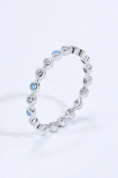 Elegant 925 sterling silver ring with natural moonstone centrepiece and zircon accents