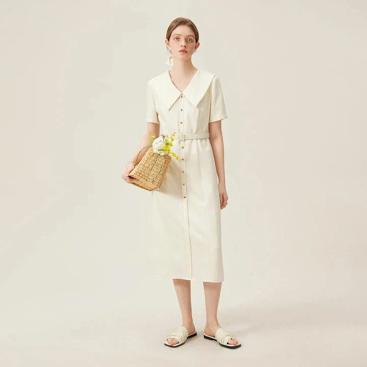 Elegant mid-calf summer dress in a sophisticated style, suitable for professional office wear and special occasions.