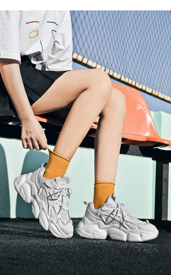 Premium casual trainers with a sleek, minimalist design and durable rubber sole for versatile, comfortable wear.