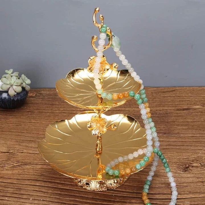 Elegant gold wedding cake stand with a sleek and sturdy metal construction, perfect for showcasing your wedding cake in style.