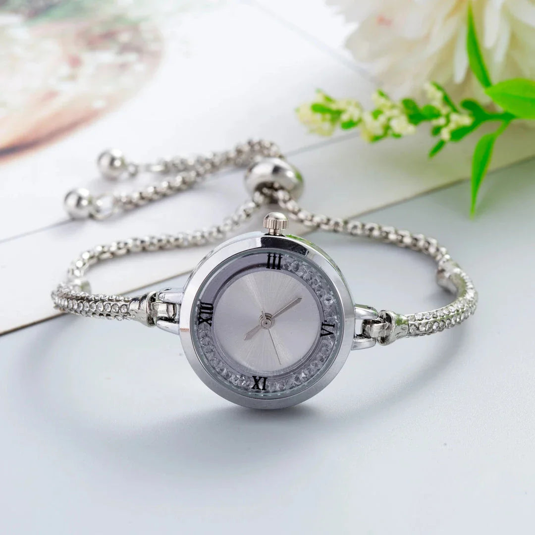 Elegant stainless steel quartz women's watch with compact dial, designed for timeless style and functionality