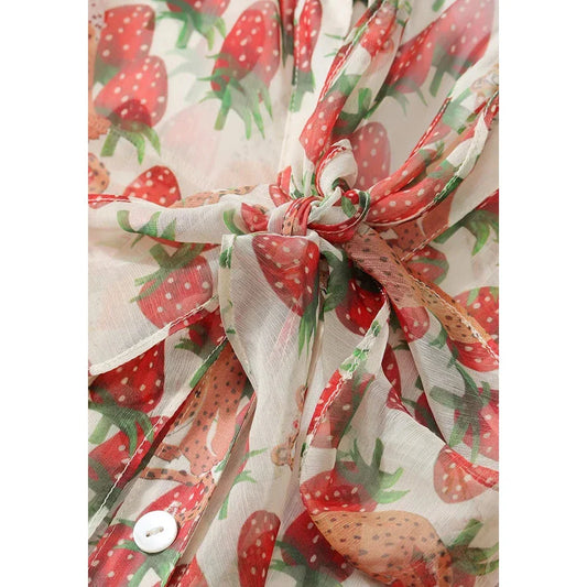 Stylish floral chiffon blouse with elegant lantern sleeves, vibrant patterns, and delicate bow collar