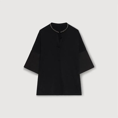 Stylish bead-embellished split-hem t-shirt in white, designed for the modern British woman with a touch of elegance and comfort.