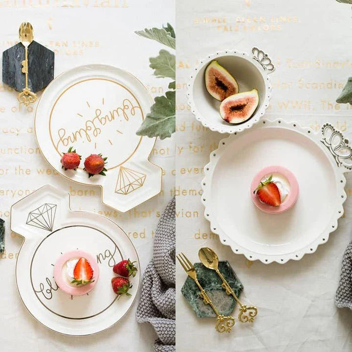 Elegant diamond ring-inspired porcelain dinnerware set with plate, bowl, and cup in a minimalist white colour
