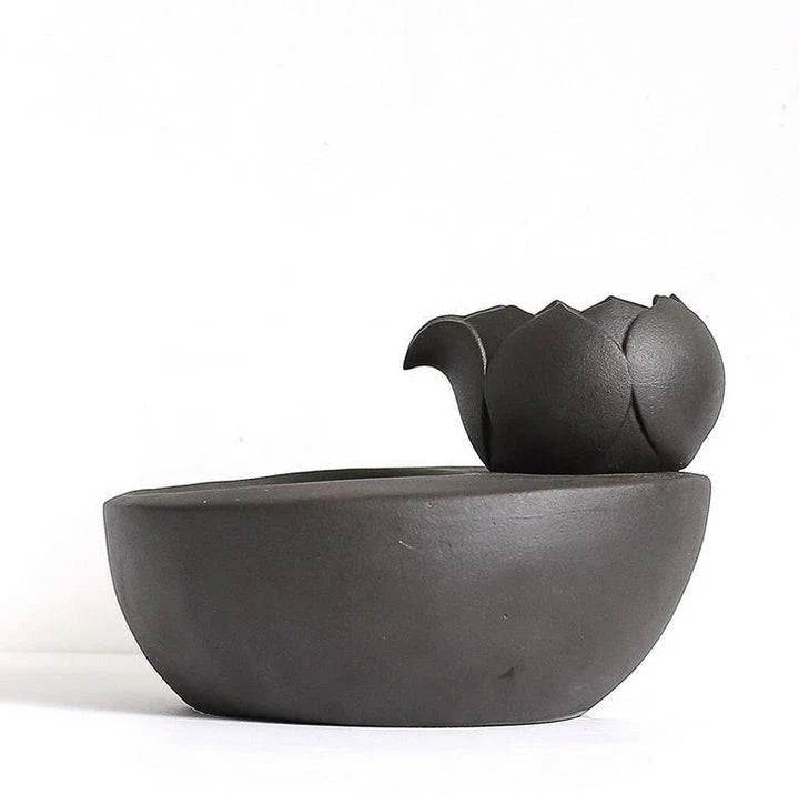 Elegant British-inspired ceramic drinking fountain with adjustable water flow and soothing ambiance