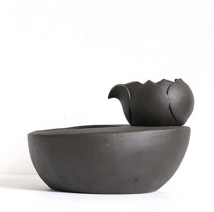 Elegant British-inspired ceramic drinking fountain with adjustable water flow and soothing ambiance