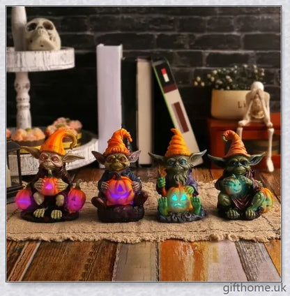 Eerie Halloween Resin Figurine with Glowing Pumpkin Lamp, a spooky and enchanting décor piece for your holiday celebrations