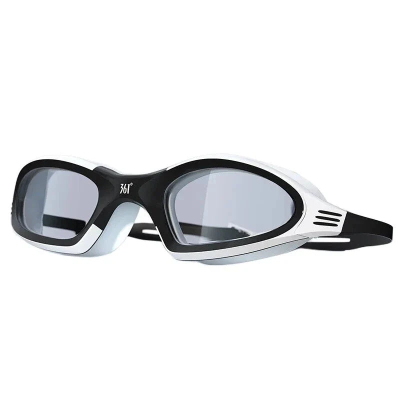 A pair of high-performance anti-fog, waterproof swimming goggles with polycarbonate lenses and a flexible silicone frame, designed for optimal clarity and comfort during swimming activities.