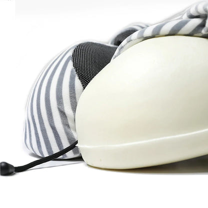Premium memory foam travel pillow with soft cotton cover, designed for comfortable neck and spinal support during travel and relaxation