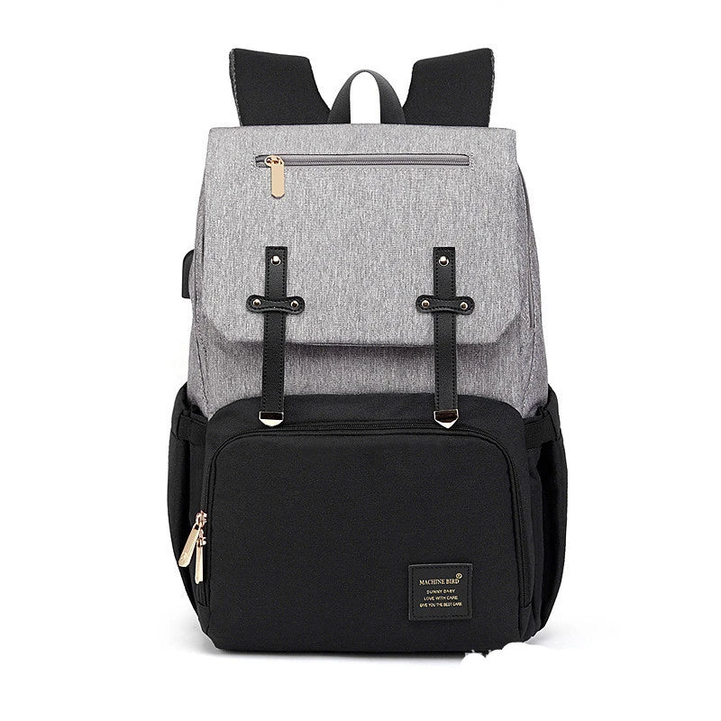 A stylish and practical mummy backpack with multiple pockets, perfect for organising and transporting all your parenting essentials.