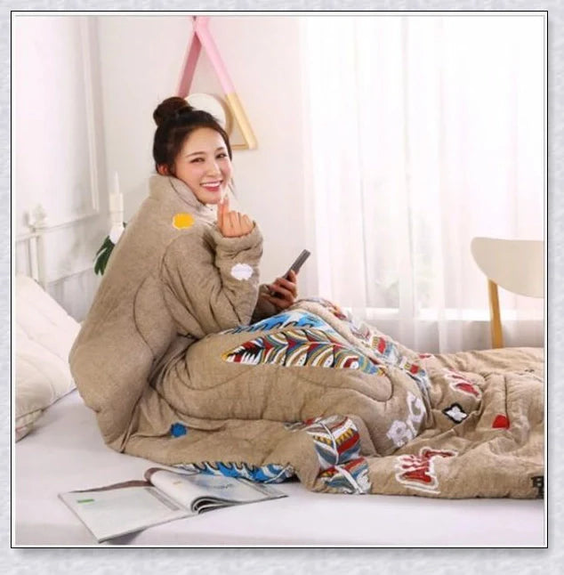 A cosy, wearable quilt with sleeves in a variety of colourful designs, perfect for staying warm and comfortable during the winter months.