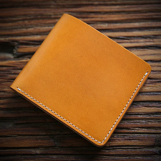 Premium first-layer cowhide money clip in a variety of classic British colours, designed for refined style and secure everyday carry