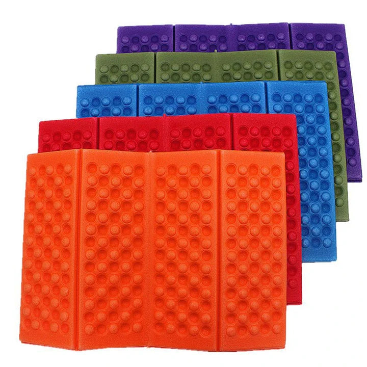 Foldable, waterproof camping mat made of high-quality XPE foam with honeycomb protrusions for added comfort and support