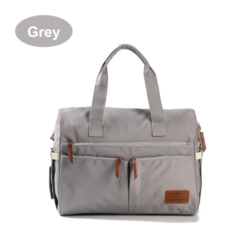 Premium 600D polyester messenger bag with spacious compartment and adjustable strap for modern mums in the UK