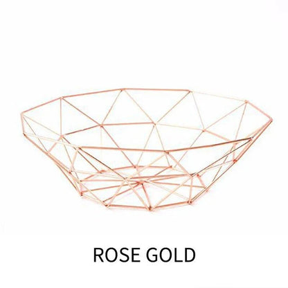 Elegant wrought iron storage basket with intricate design, perfect for home decor and versatile storage solutions
