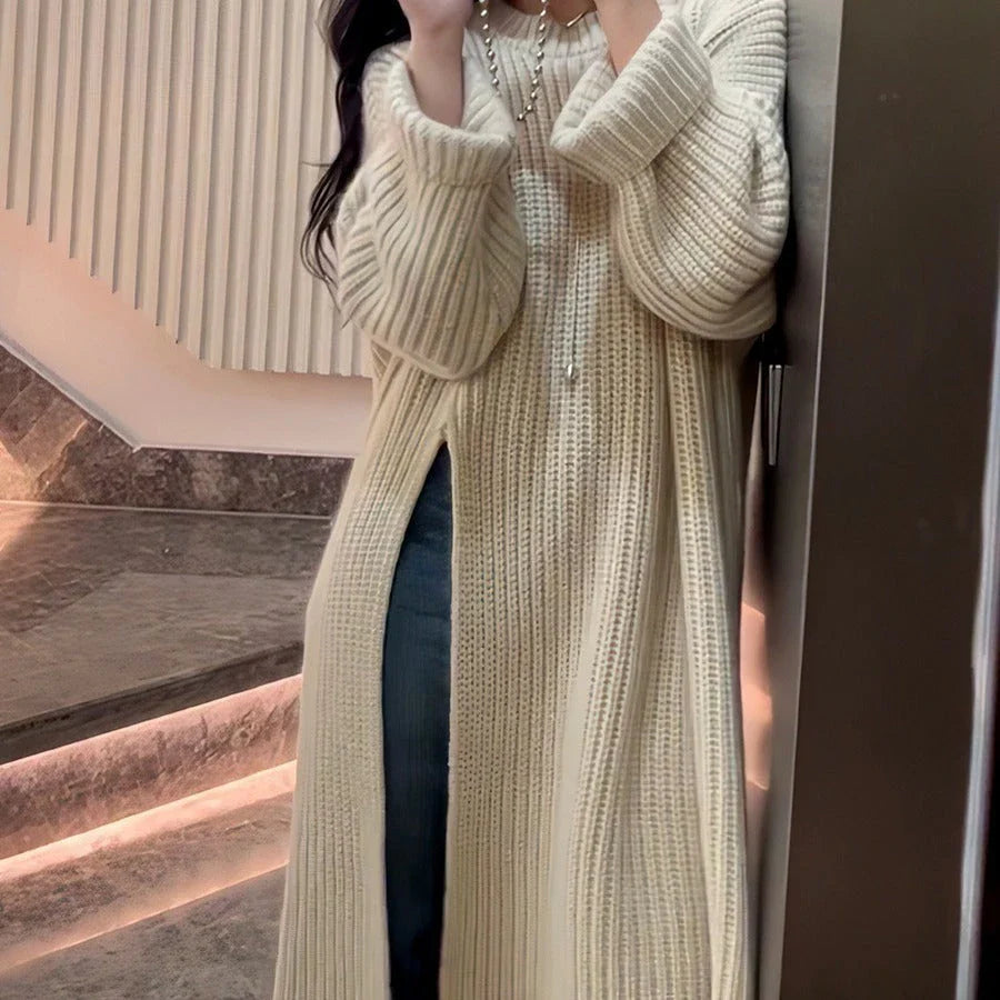 Relaxed mid-length jumper dress in a variety of colours, featuring an A-line silhouette and premium knit fabric for a comfortable, flattering fit.