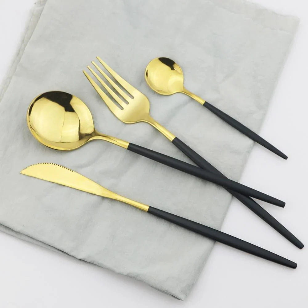 Premium 24-piece stainless steel tableware set with elegant black handles, ideal for formal and casual dining in the United Kingdom