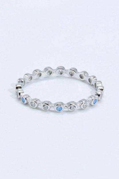 Elegant 925 sterling silver ring with natural moonstone centrepiece and zircon accents