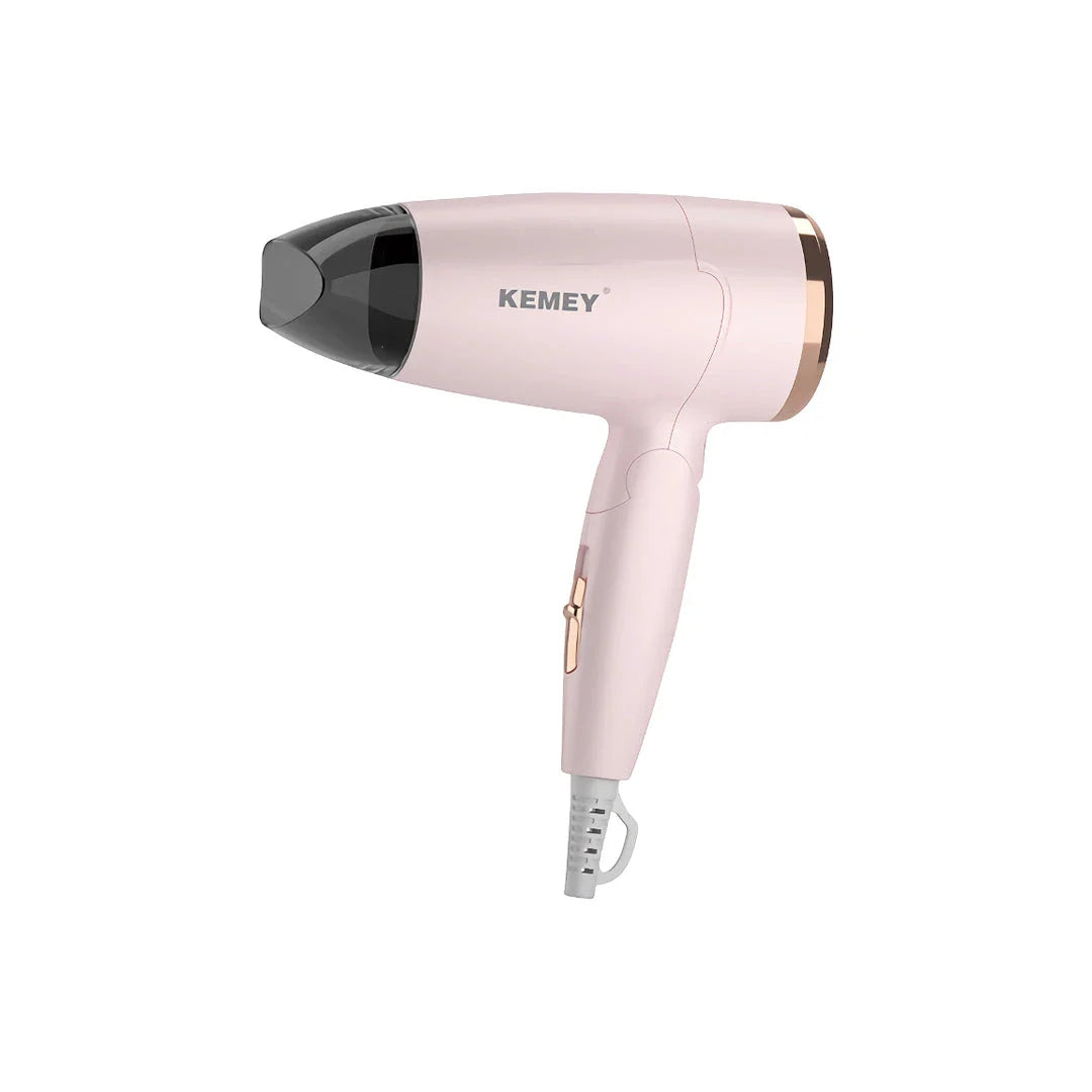 Compact and foldable hair dryer with powerful 950-watt motor for efficient styling on the go