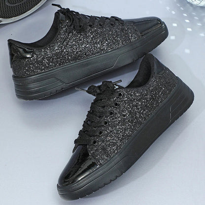 Glittering sequin flats with thick soles and lace-up closure in various vibrant colours