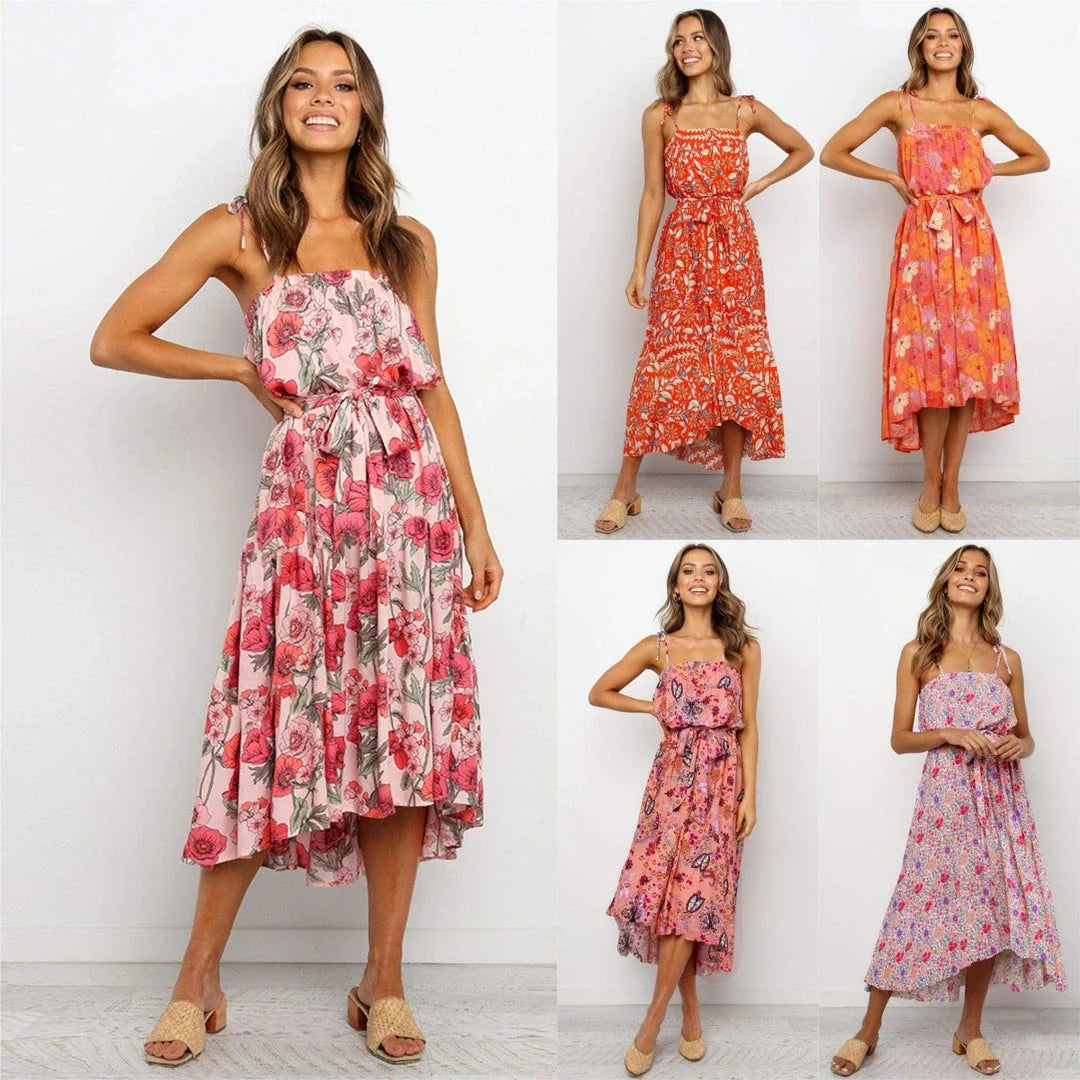 A premium printed camisole dress in a vibrant red colour, featuring a flattering mid-length skirt and high-waist design for a sophisticated, feminine look.