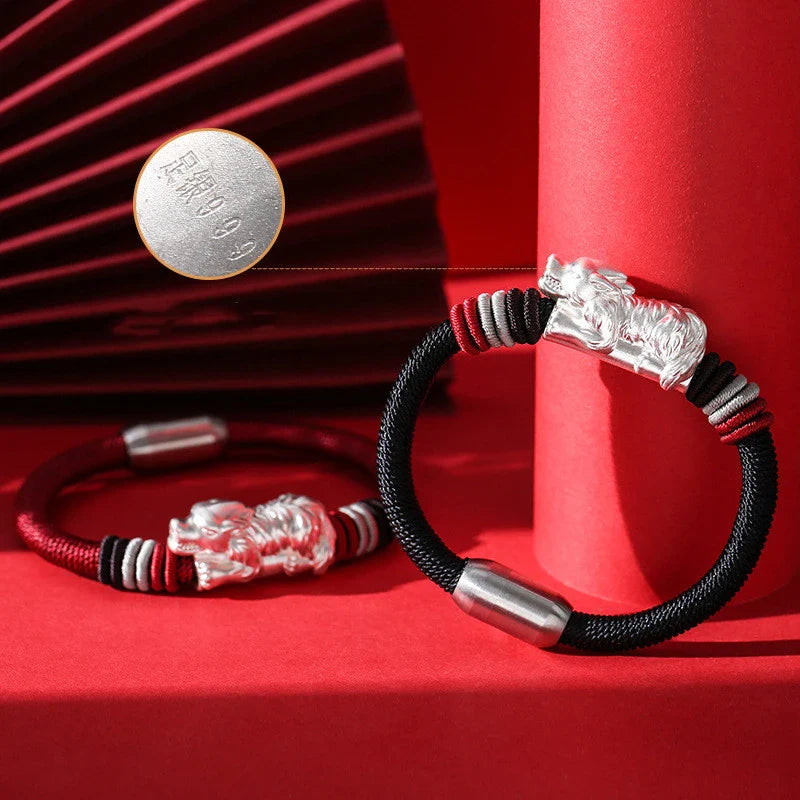 A premium hand-woven bracelet crafted with silver material, featuring a geometric design for a modern and sophisticated look.