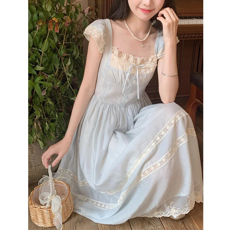 Elegant lace bow blue long dress for stylish ladies, featuring a high-waisted design and sleeveless silhouette for a sophisticated formal look.