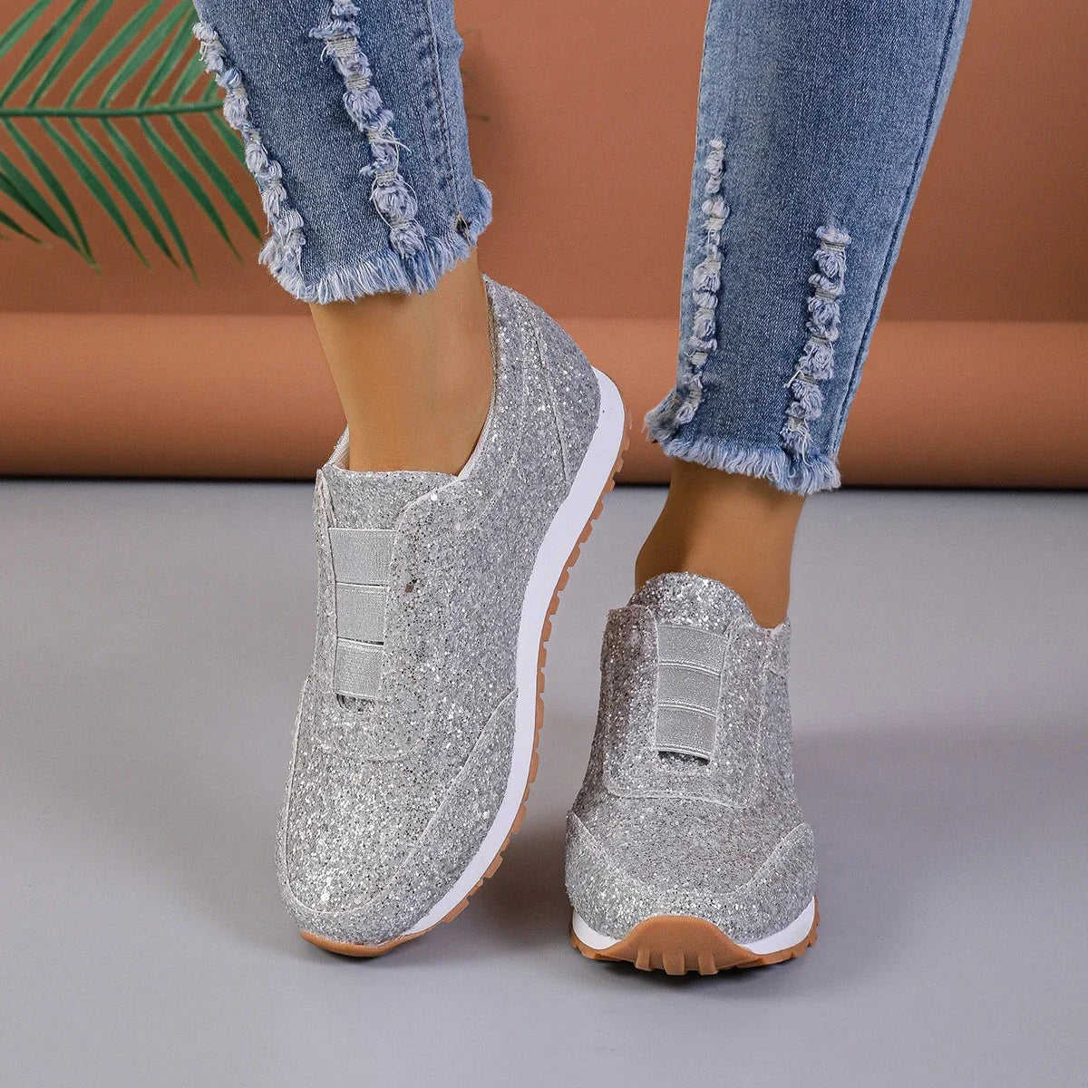 Premium sequinned flats with round toe and slip-on design, perfect for casual wear and special occasions.