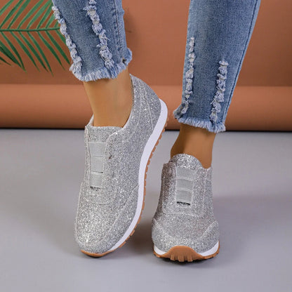Premium sequinned flats with round toe and slip-on design, perfect for casual wear and special occasions.
