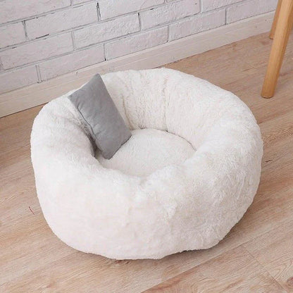 Cosy and comfortable fleece round cat bed in pink colour, perfect for your beloved feline friend to relax and unwind.