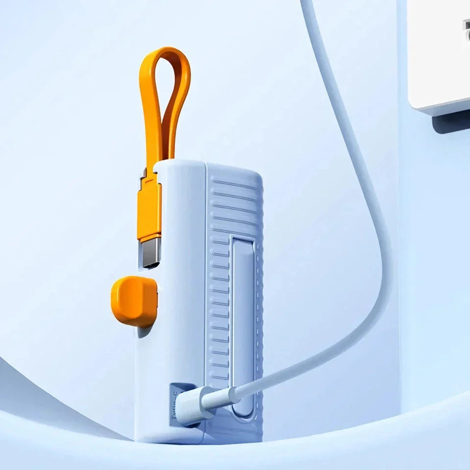 Compact, high-capacity power bank with dual charging ports and built-in cables for convenient, fast charging on the go