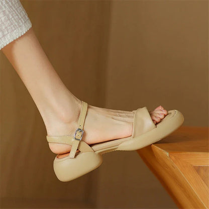 Premium leather chunky heel sandals in black with adjustable buckle strap for comfortable, stylish summer wear
