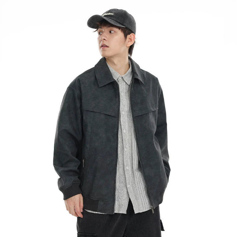 A classic distressed leather jacket in a relaxed, unstructured fit suitable for both men and women