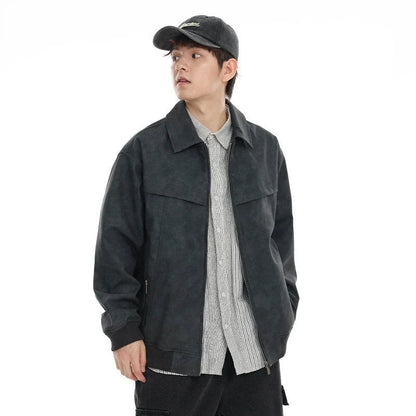 A classic distressed leather jacket in a relaxed, unstructured fit suitable for both men and women