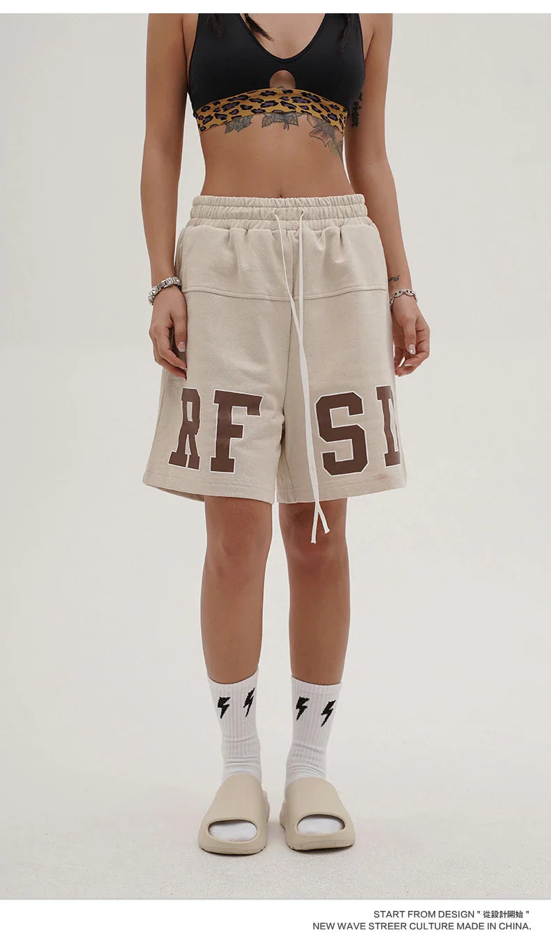 Premium loose-fit sports shorts with eye-catching printed patterns in black, khaki, and dark grey colours