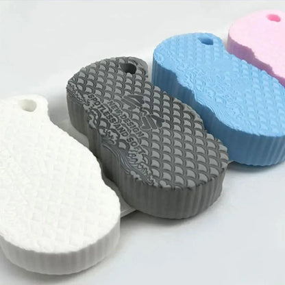 Luxurious white exfoliating bath sponge with a unique hardening design for hygienic and convenient use